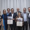 Im Bild: v.l. Marianne Durig (Jury), Iris Reiter (Jury), Thomas Bodmer (Bauherr, Vorsitzender des Kuratoriums der Stiftung Mozarteum), Rainer Heneis (Bauherr, Geschäftsführer der Stiftung Mozarteum), Erich Marxs (Bauherr, ehem. Vorsitzender des Kuratoriums der Stiftung Mozarteum), Maria Flöckner und Hermann Schnöll (Architekt*innen Mozarteum Foyers) sowie Landeshauptmann-Stellvertreter Stefan Schnöll.